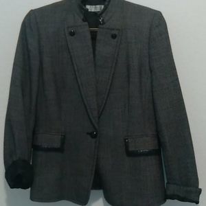 Taheri winter and fall blazer. Collar has a little sun demage.